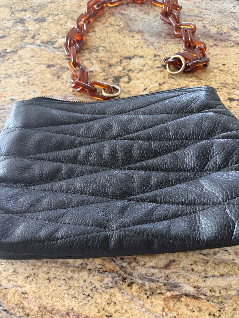 Black Quilted Leather Crossbody Bag with Tortoise Chain with bag. - Picture 4 of 5